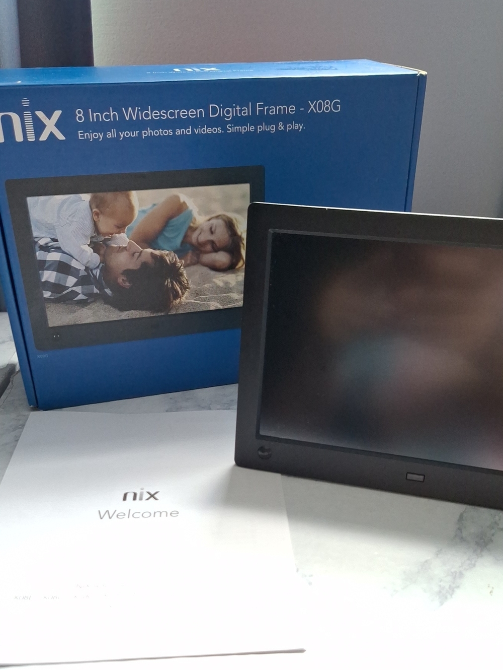 Nix 8-Inch Digital Photo Frame in Black and Blue Packaging
